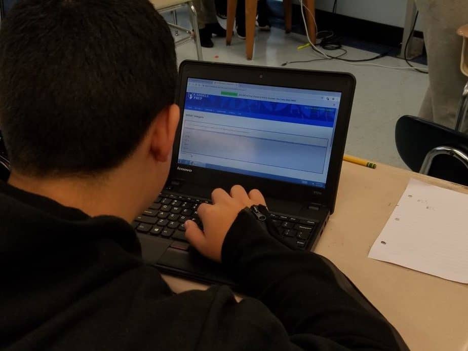 Student studying with a laptop